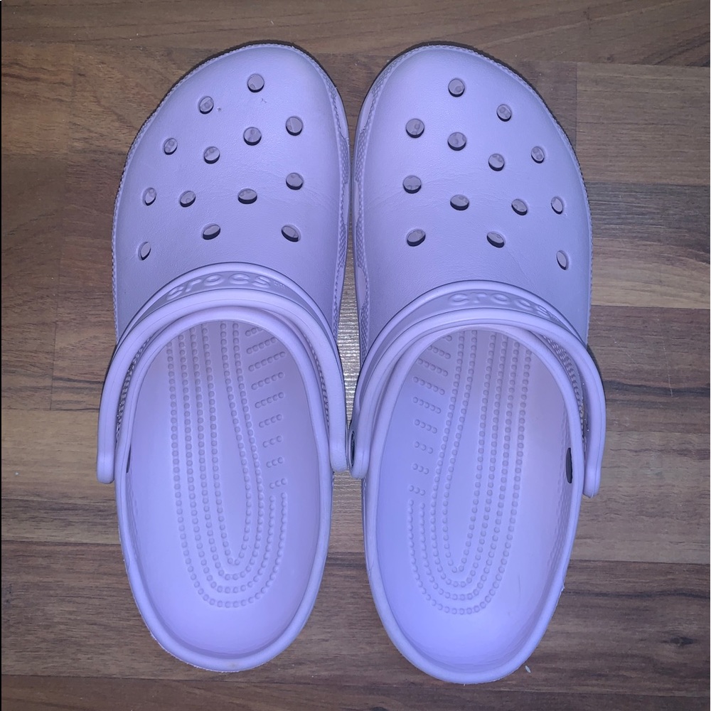 Purple crocs size 11 in W and size 9 in M